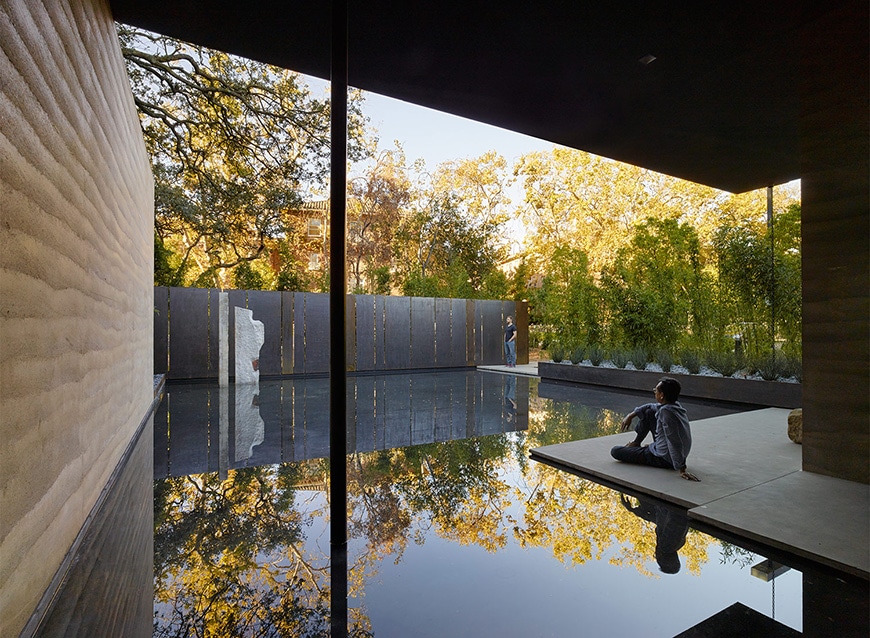 Windhover contemplative center, rammed earth building, reflecting pool